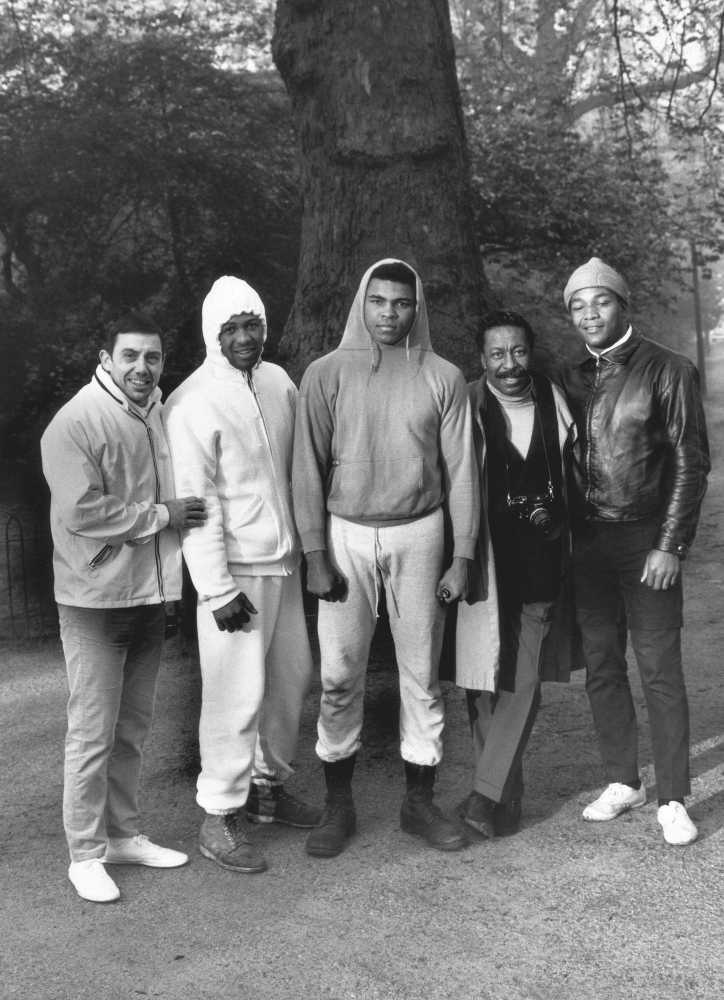 Photographer Unknown, Muhammad Ali, Gordon Parks, and others (right to left,
Angelo Dundee, Jimmy Ellis, Jim Brown), Hyde Park, London, England, 1966