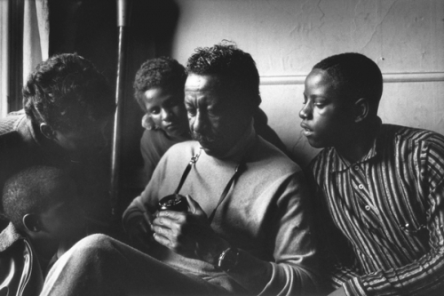 Photographer Unkown, Gordon Parks showing his camera to the Fontenelle Children, Harlem, New York, 1968